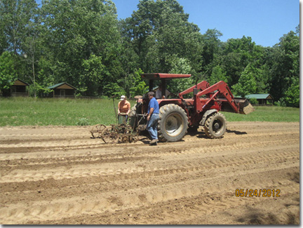 Andy Mills, Meade County Extension Agent working to put in food and wildflower plots