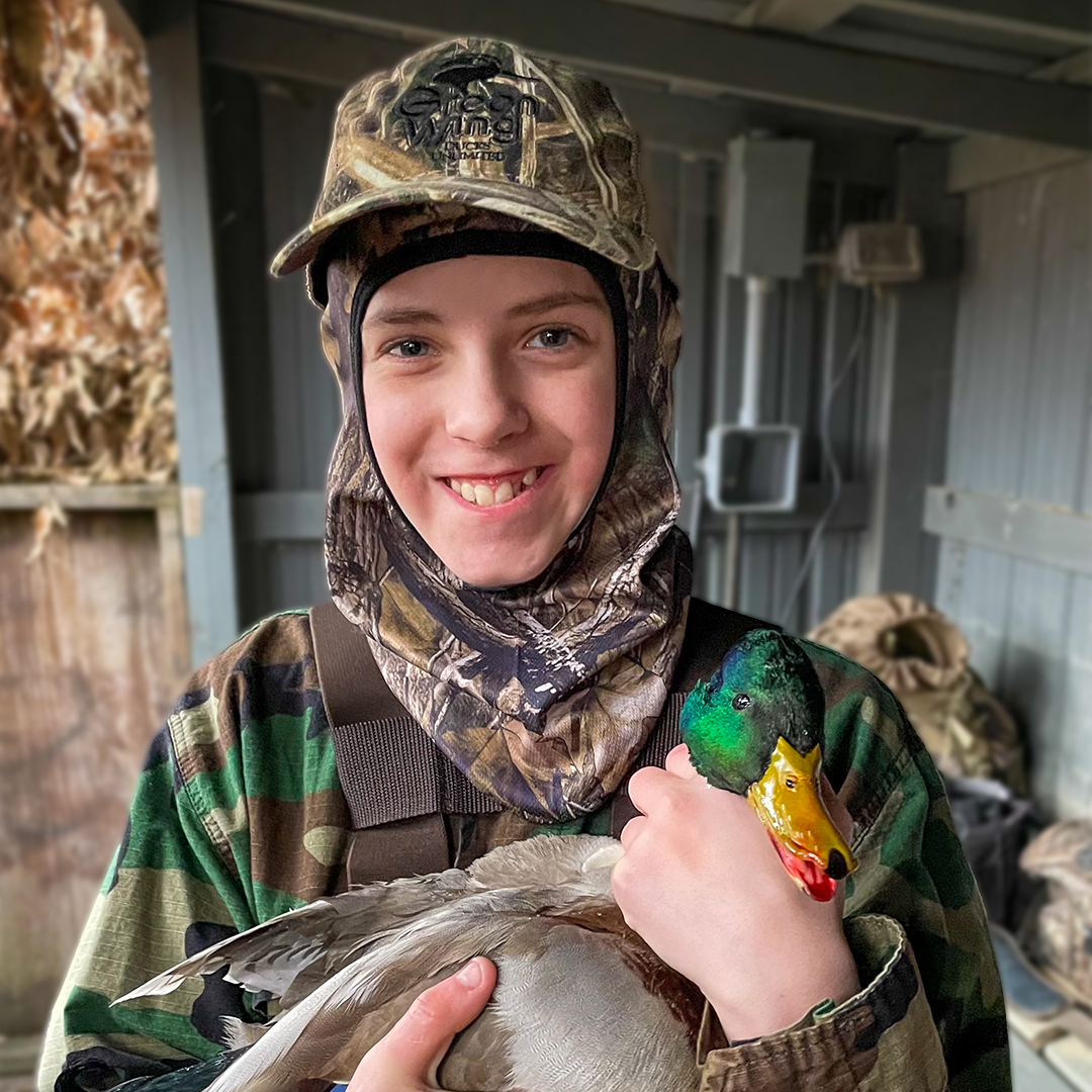 Student Hunter holding a duck