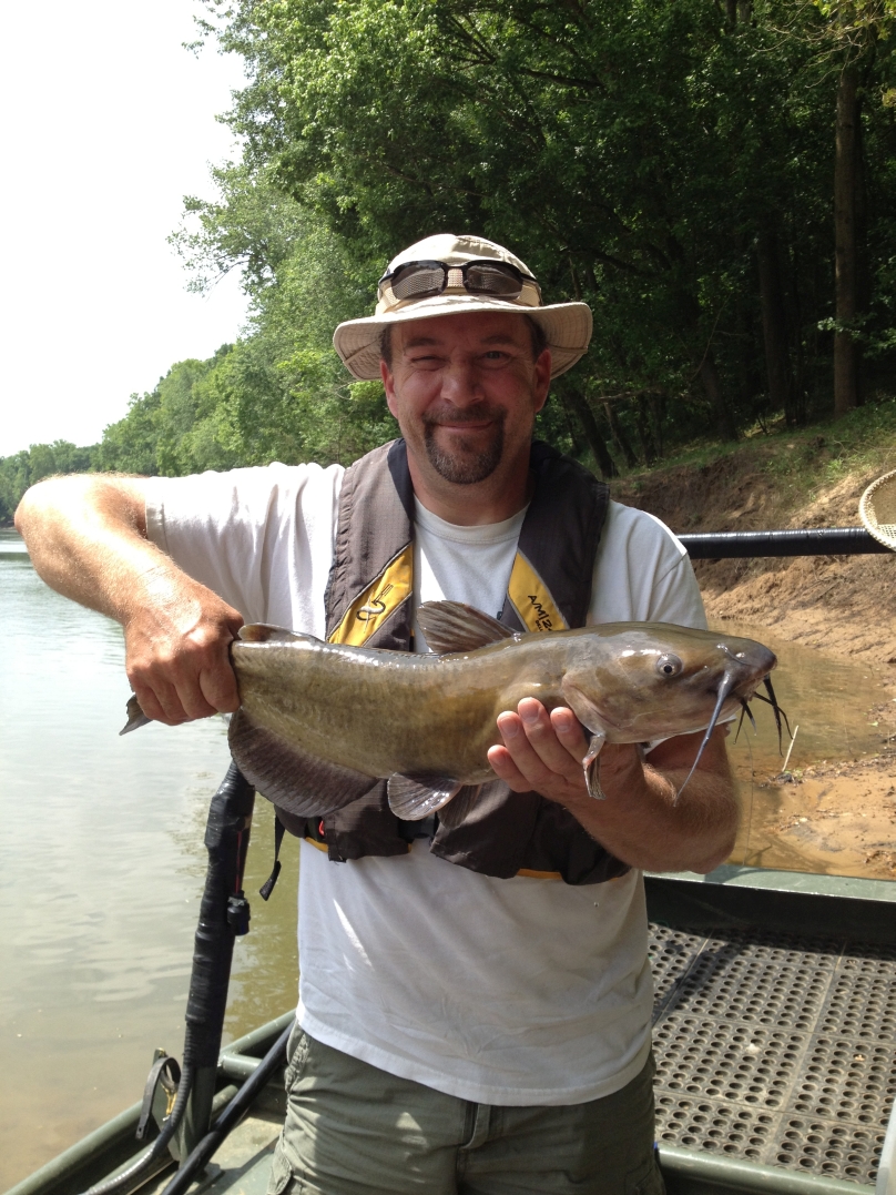 Chris Bowers holds up a nice channel catfish collected and released during routine sport fish surveys.