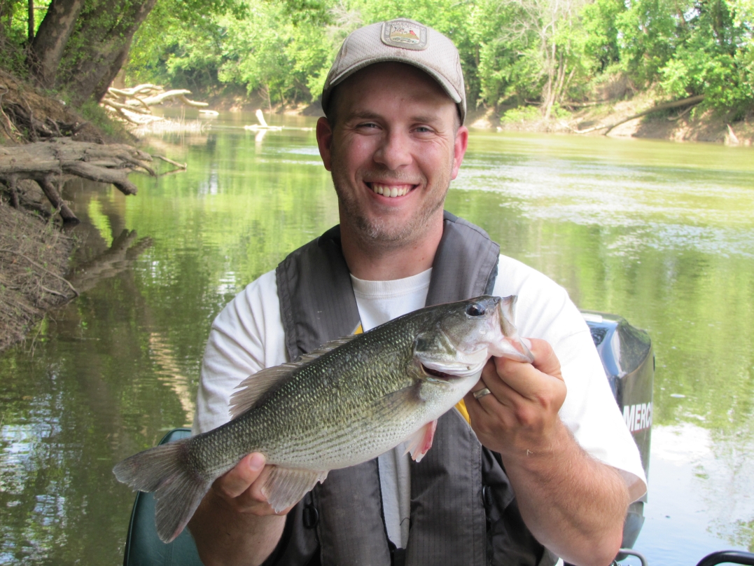 David Baker holds a nice spotted bass that was collected and released during sport fish surveys.