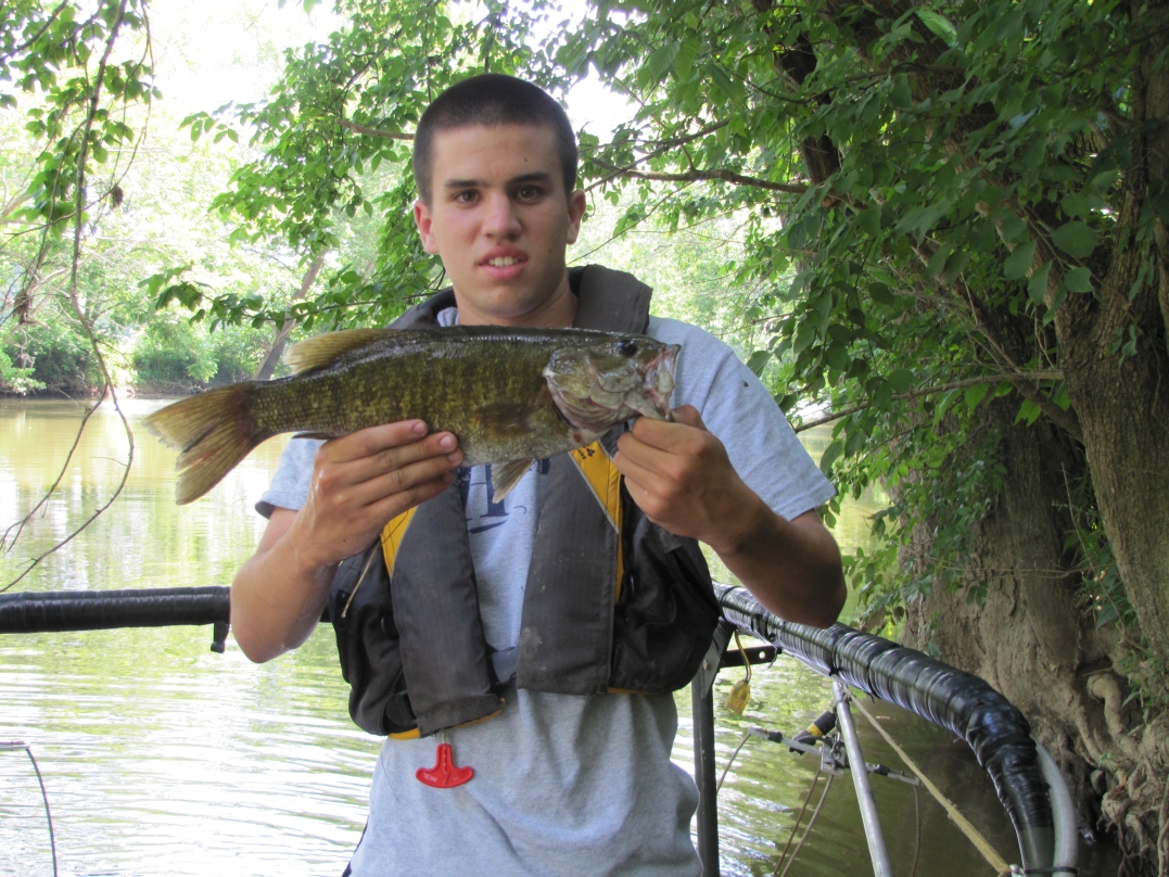 Smallmouth can be found in areas with rocky bottoms around riffles, like this 17 inch smallmouth bass that David Dick collected and released during an electro-fishing survey.