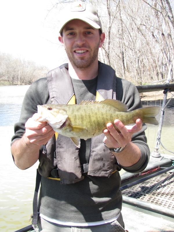 Jay Herrala holds a nice smallmouth bass collected and released during spring sampling.