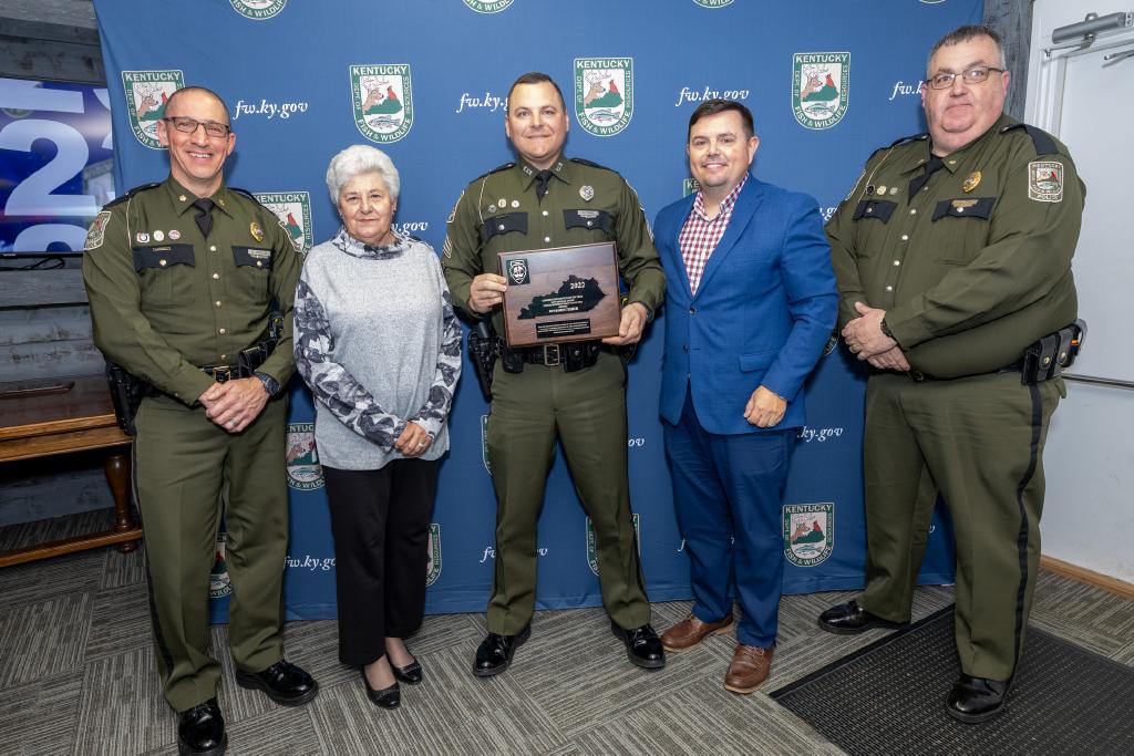 Pictured left to right Law Enforcement Division Assistant Director Maj. David Marques, United Bow Hunters of Kentucky representative Judy Roberts, Sgt. Ben Fisher, Commissioner Rich Storm, and Law Enforcement Division Assistant Director Maj. Greg Watts.