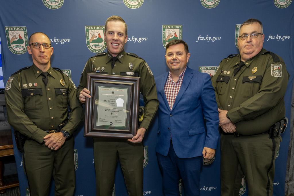 Pictured left to right Law Enforcement Division Assistant Director Maj. David Marques, Sgt. Zack Carney, Commissioner Rich Storm, and Law Enforcement Division Assistant Director Maj. Greg Watts.