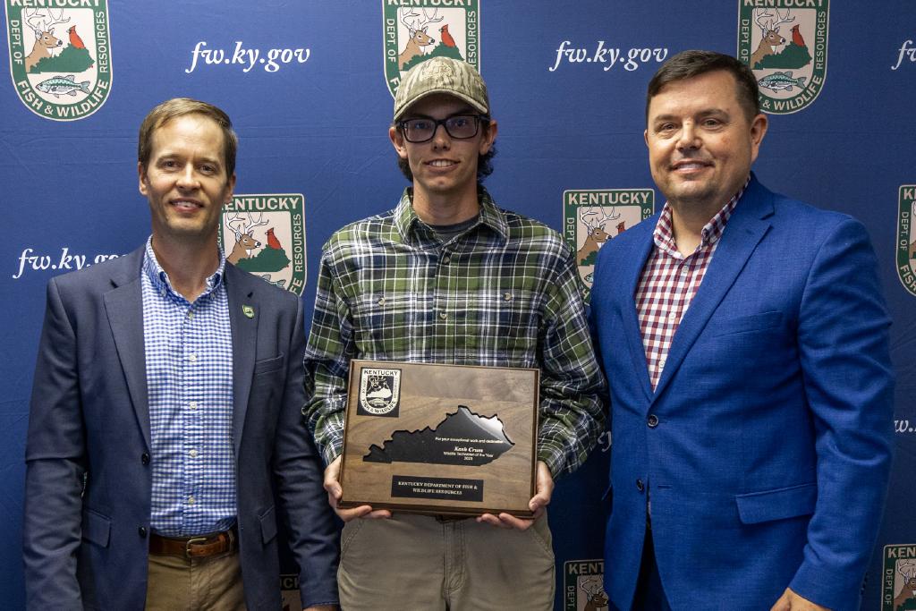 Pictured left to right Wildlife Division Director Ben Robinson, Cash Krum, and Commissioner Rich Storm.