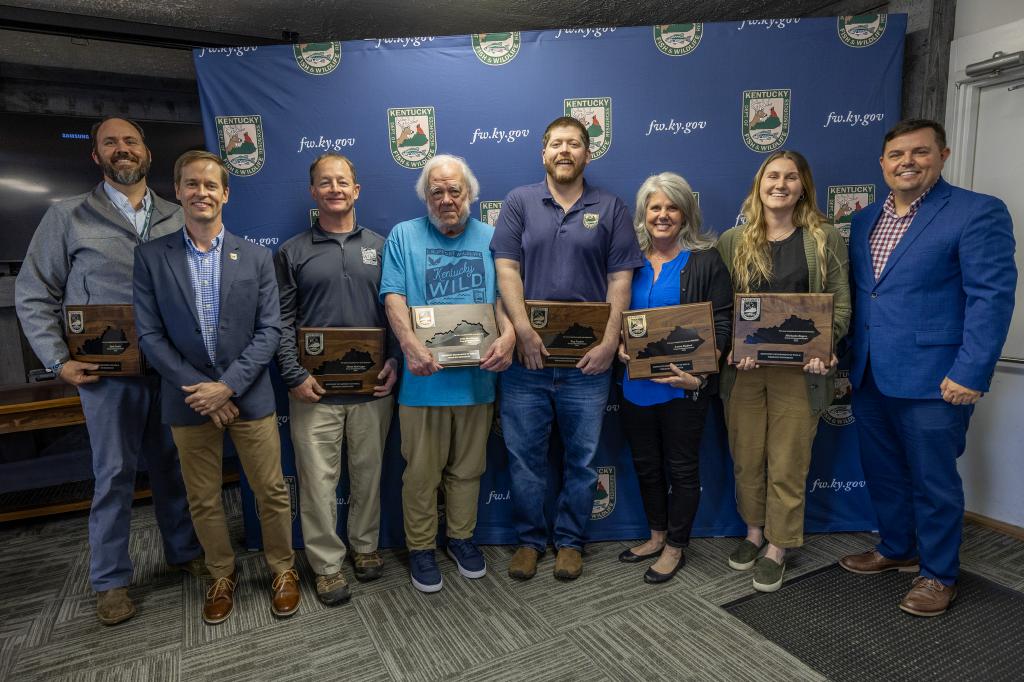 Pictured left to right Zack Couch (now Executive Director of Kentucky Nature Preserves), Wildlife Division Director Ben Robinson, Monte McGregor, John MacGregor, Trey Prather, Laura Burford, Michaela Rogers, and Commissioner Rich Storm.